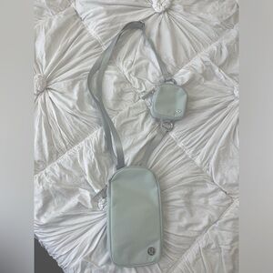 lulu bag phone cross body!! i never wear it, only worn once. in a light blue